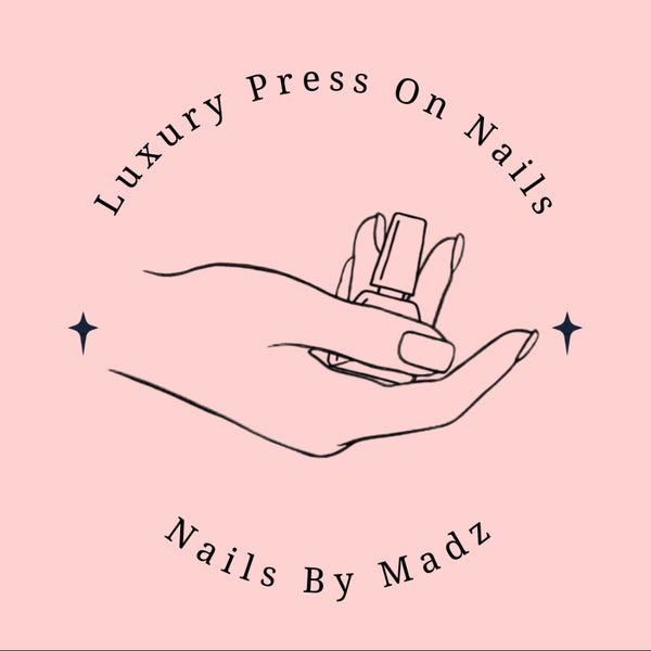 Logo. hand holding nail polish. Luxury Press On Nails. Nails By Madz.
